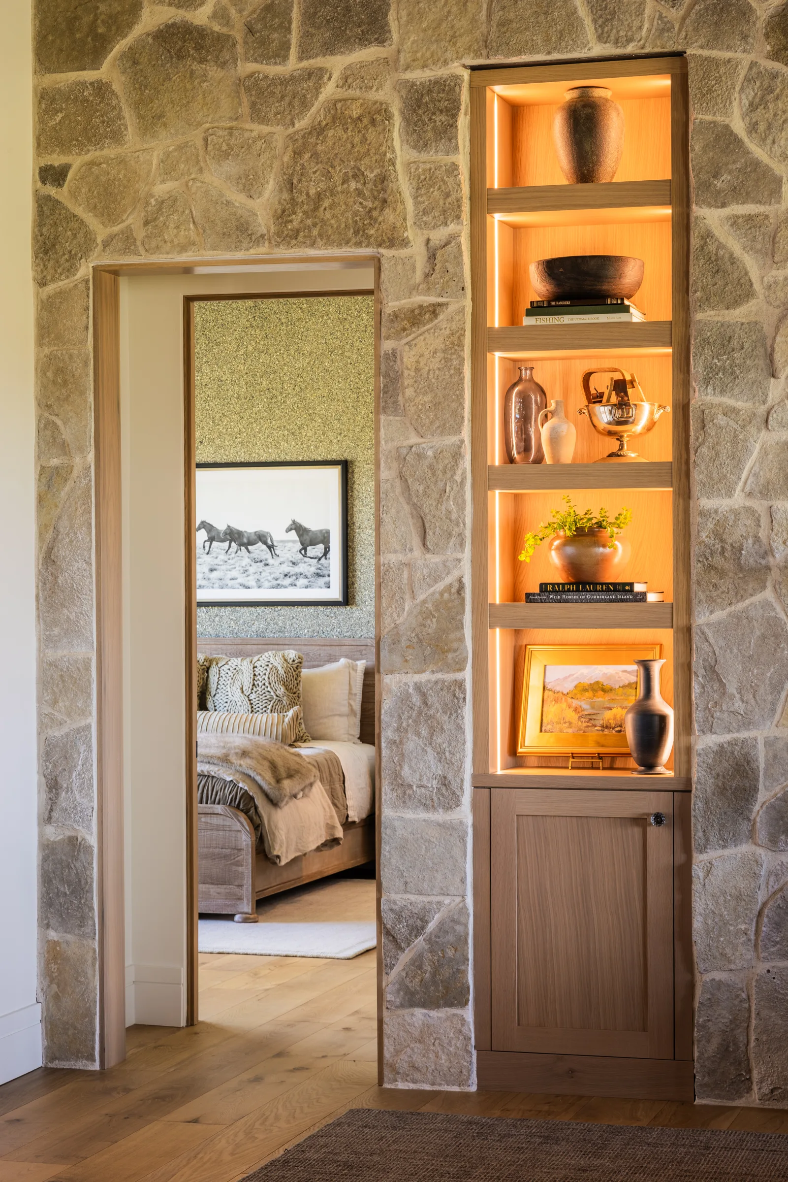 Stone and walnut kitchen in evening light
